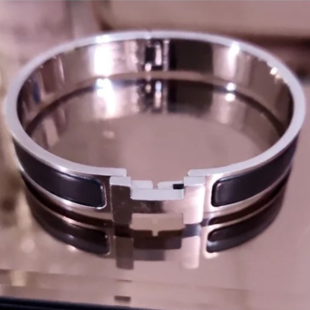Hermès Clic H silver and black bracelet